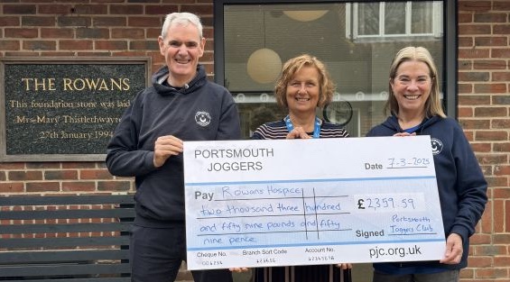 Tony and Sue presenting a cheque to Rowans Hospice